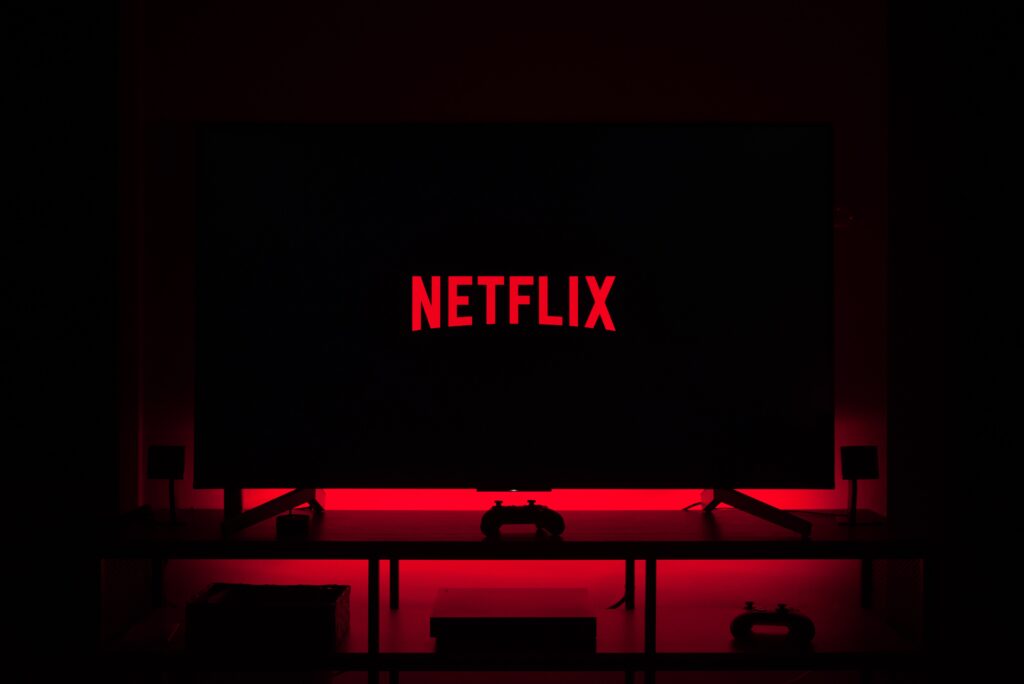 Netflix logo on a dark television