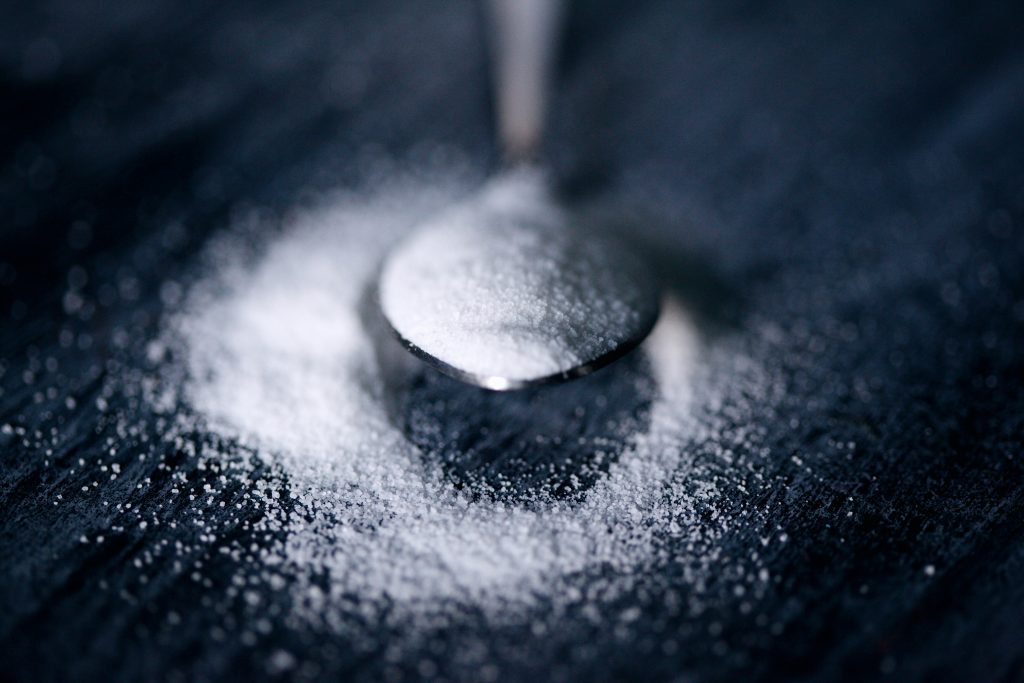 A spoon with artificial sweetener