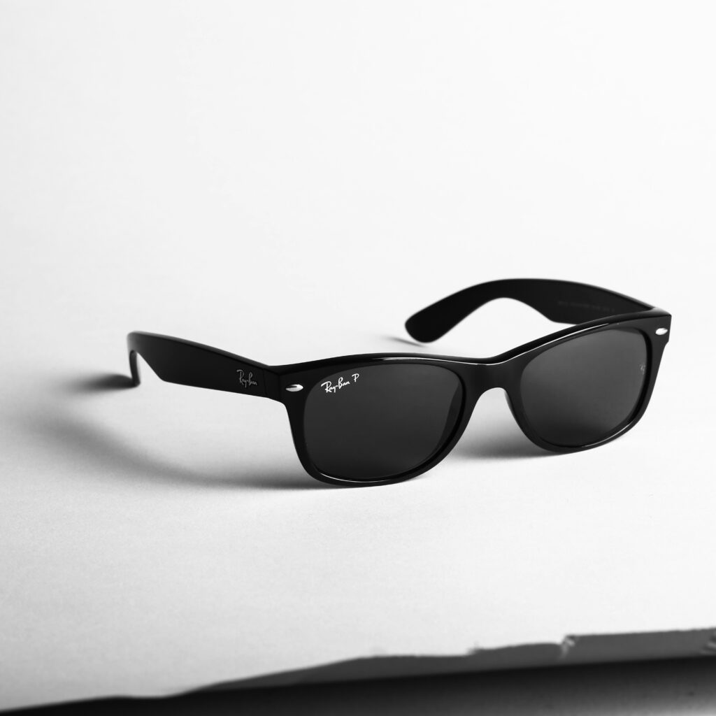 a pair of Ray Ban sunglasses