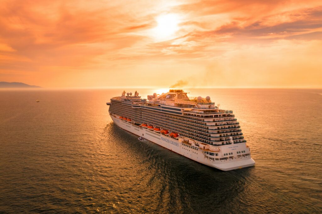 a cruise ship at sunset